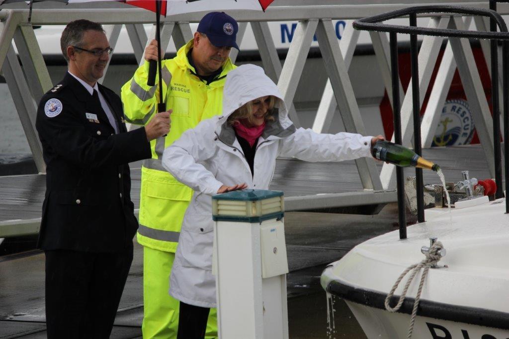 Barbara Cooley pours the ceremonial champagne for Port Jackson 30  - Marine rescue NSW  © Ken McManus